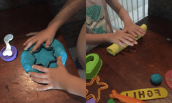 manipulating and cutting the play dough